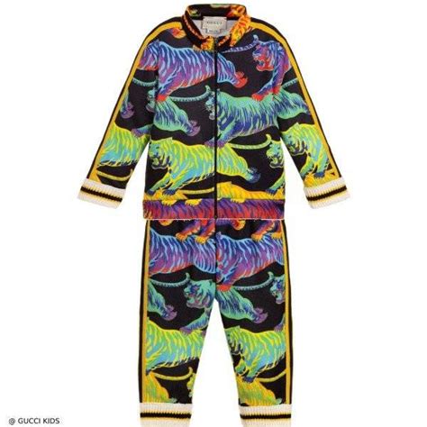 gucci tiger tracksuit.